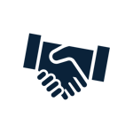 People sitting at a table shaking hands.
